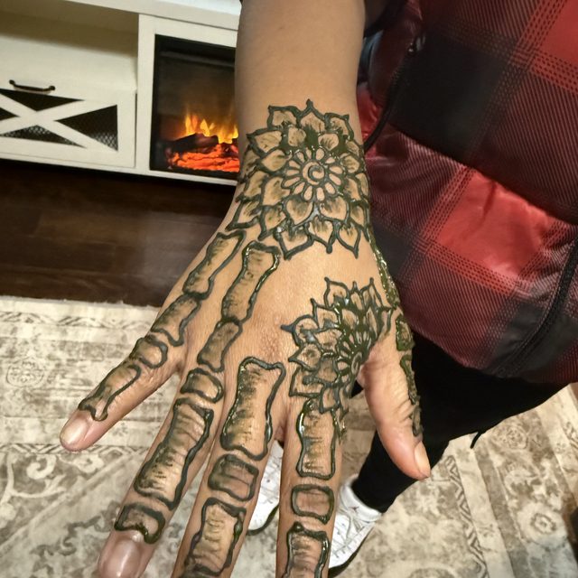 Floral mandala henna design on the back of the hand by Henna House, Olive Branch MS