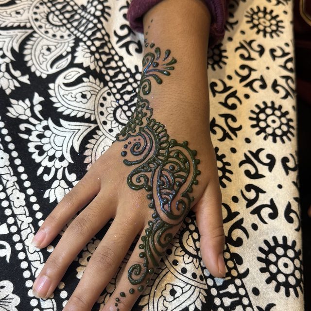 Paisley lace henna pattern on the hand
